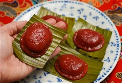 Màquina de pastissos de tortuga vermella